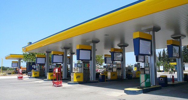 Naftal fuel station with yellow canopy and pumps on an Algerian roadside