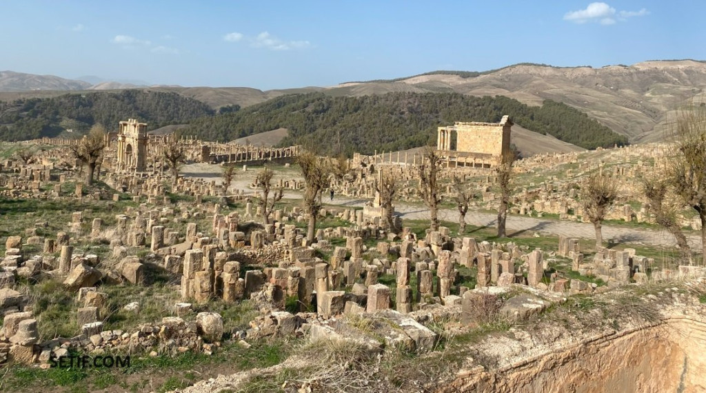 Ruins of Djémila's Roman city spread across a hillside