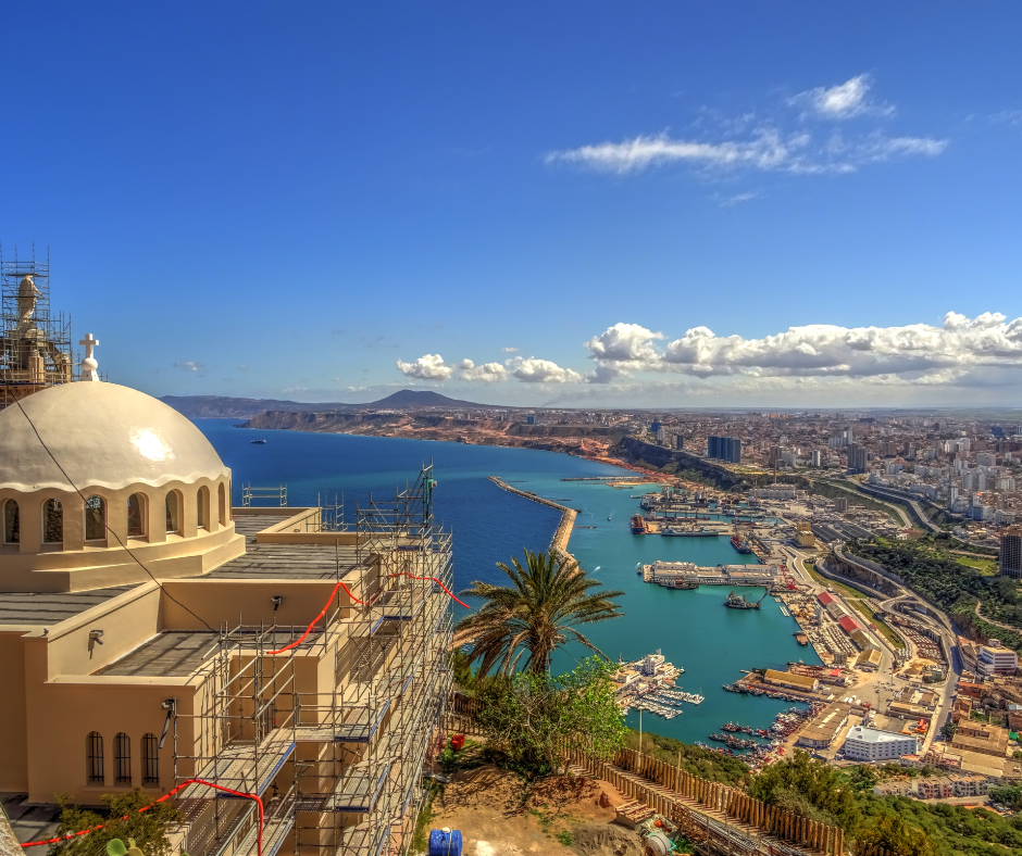 Santa Cruz chapel dome in scaffolding above the port and bay of Oran