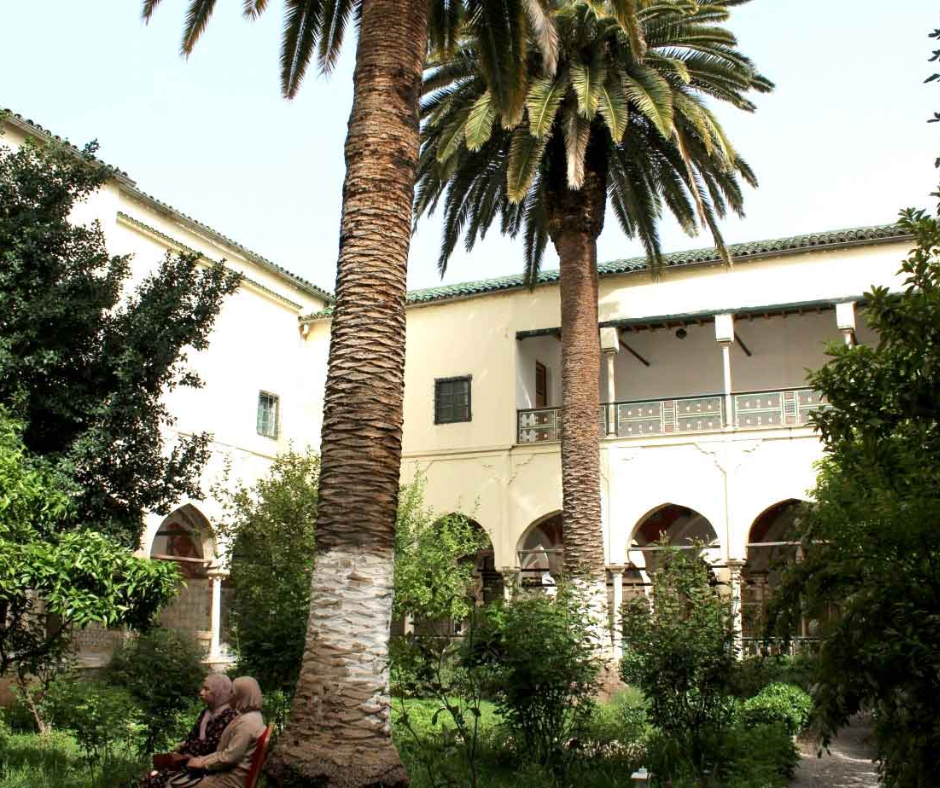 Courtyard of the Palace of Ahmed Bey in Constantine with palm trees and arcades
