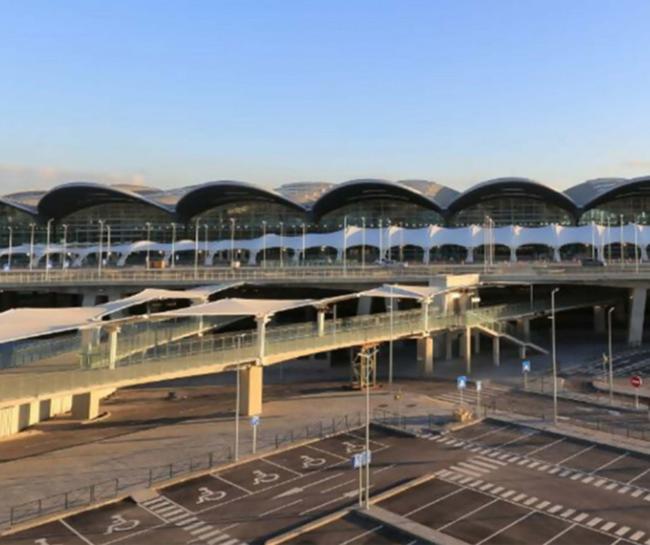 Curved roof terminal of Houari Boumediene Airport in Algiers at dusk