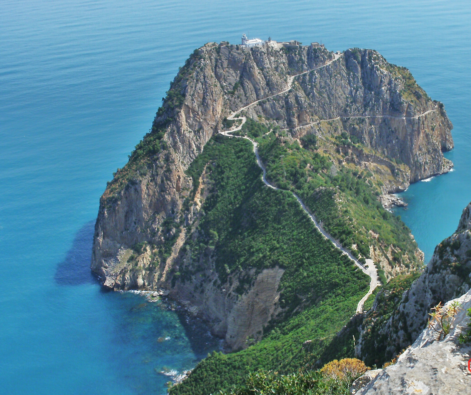 Cap Carbon headland with its lighthouse and zigzag path above the sea near Bejaia