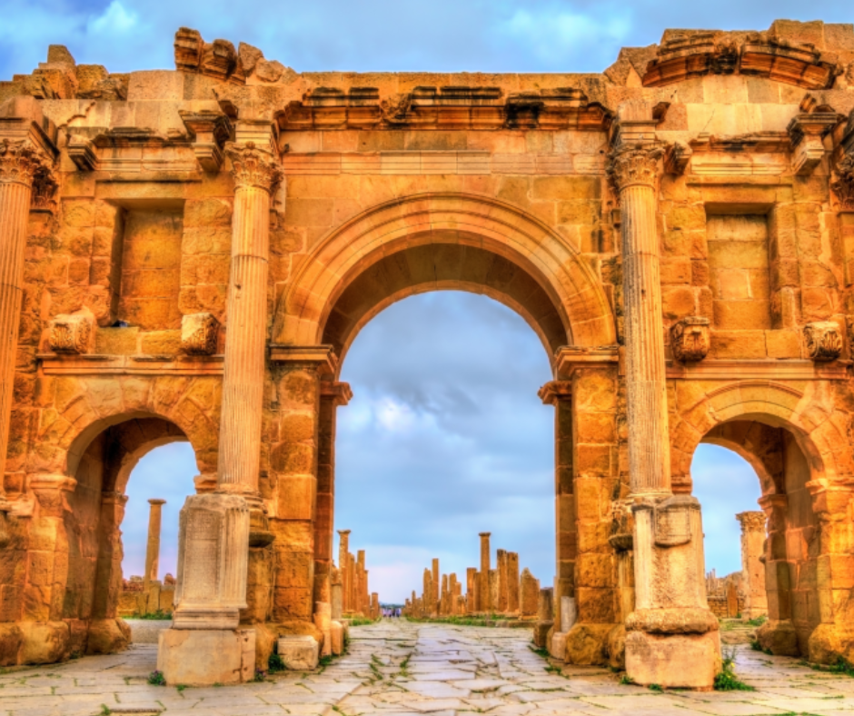 Triple Roman arch with Corinthian columns at Timgad