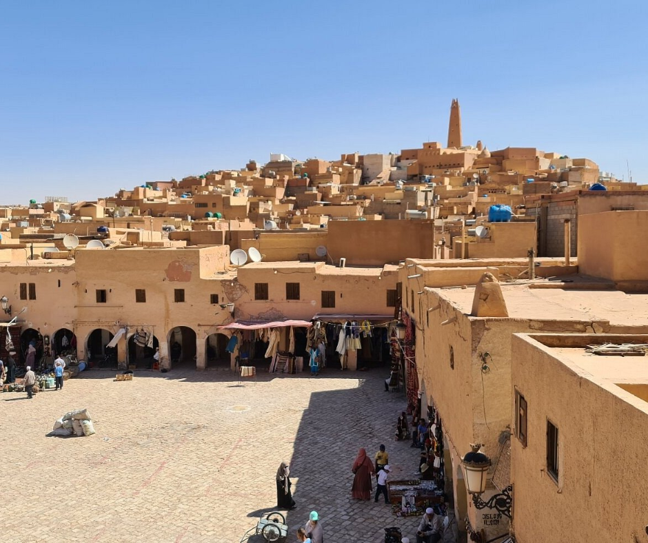 Market square lined with arcades below the hillside houses of Beni Isguen