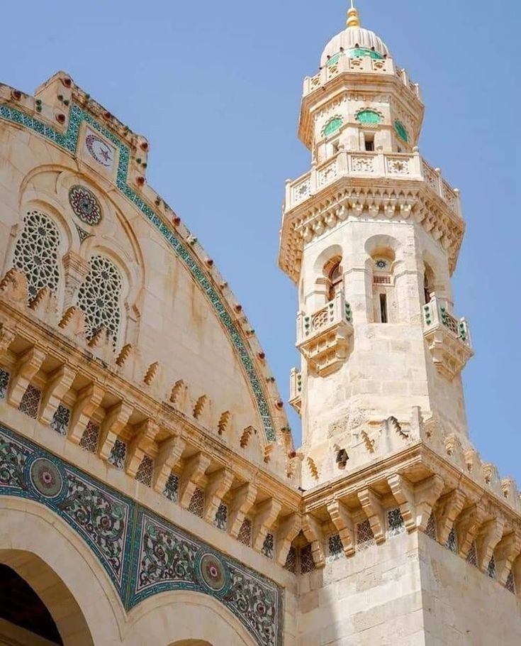 Carved minaret and tiled facade of Ketchaoua Mosque in the Casbah of Algiers