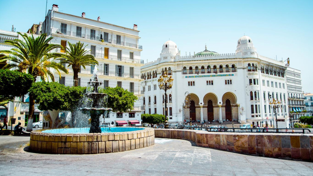 Neo-Moorish Grande Poste of Algiers with its domes, arches and a fountain in front