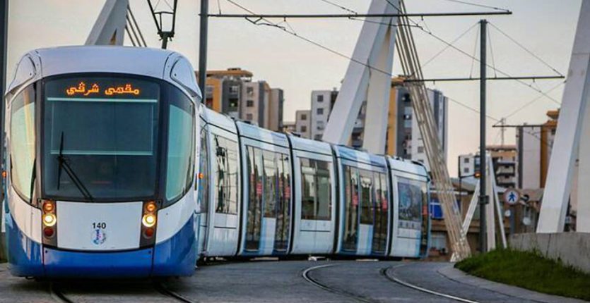 Blue and white Algiers tram on its line through the eastern districts